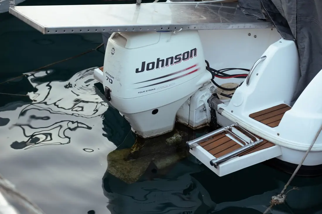 Clean outboard on a white transom