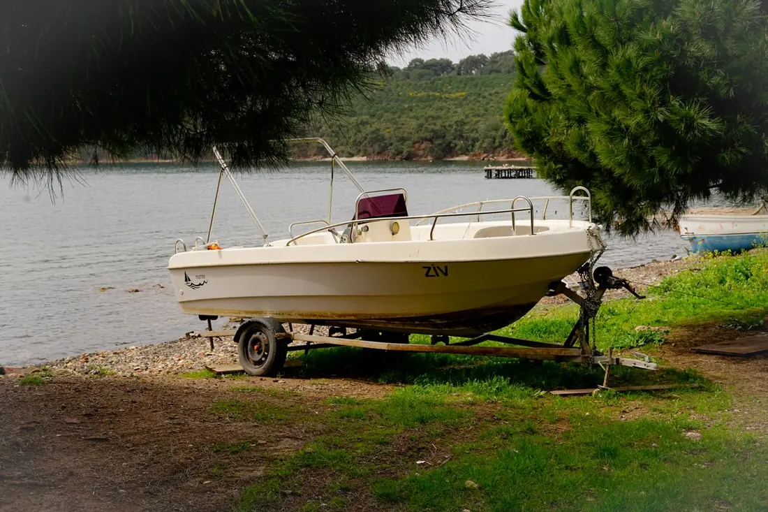 Center console on a trailer in a grassy side yard
